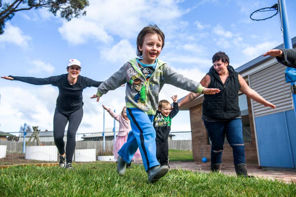 ACTIVE: Chance Williams, 4, leads Healthy Tasmania's Penny Terry, Savannah Blazely, 2, Damon Currie, 2, and Christine Currie. Picture: Scott Gelston