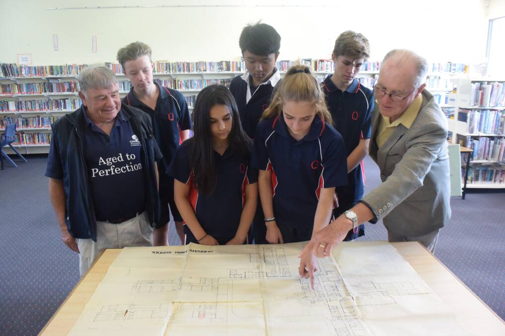 LOOKING BACK: Year 9 students from Queechy High School show former students John Suitor and Heinz Kruesmann around the grounds. Picture: Carly Dolan