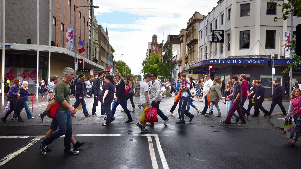 A file photo of shoppers crossing the street in Launceston.