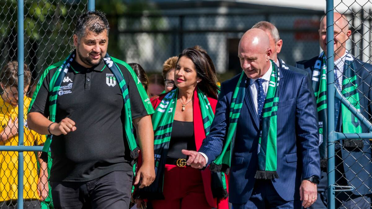 Western United Football Club CEO Chris Pehlivanis, Minister for Sport and Recreation Jane Howlett, and Tasmanian Premier Peter Gutwein walk onto York Park to announce A League returning to Launceston. Picture: Phillip Biggs