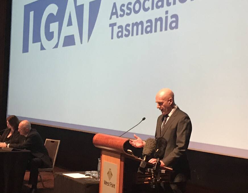 REVIEW: Treasurer and Local Government Minister Peter Gutwein addresses delegates to the LGAT meeting. Picture: Sue Bailey