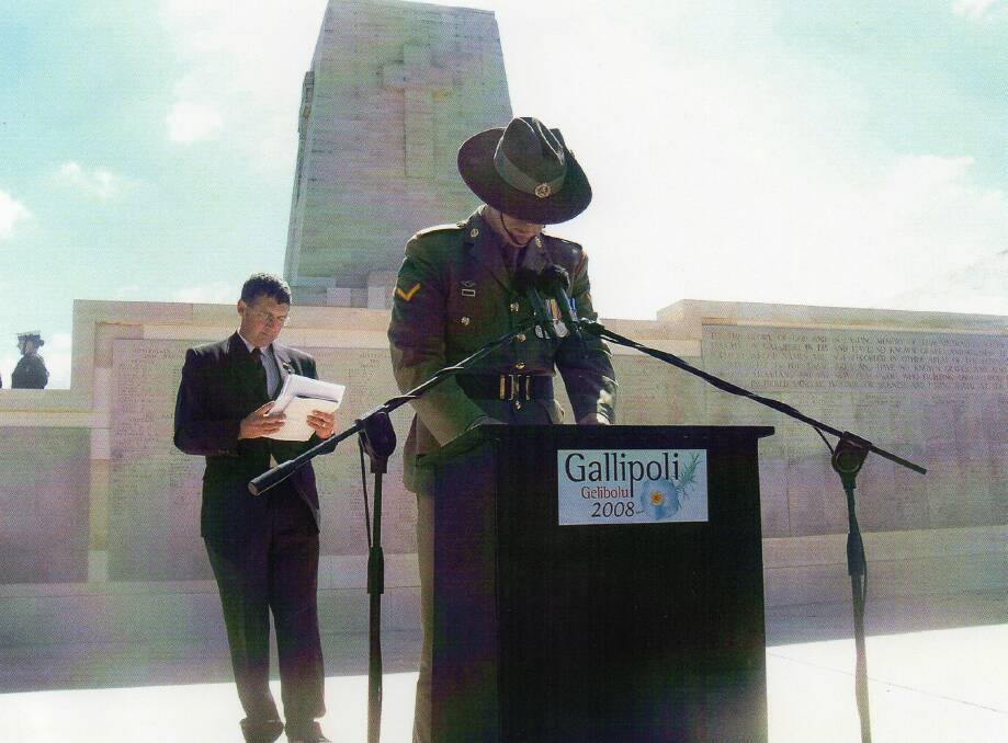 Corporal Cameron Baird at the podium at Lone Pine service speaking. At the time he had protected identity. The photo was shared exclusively with editor Courtney Greisbach by his father Doug Baird back in 2015.