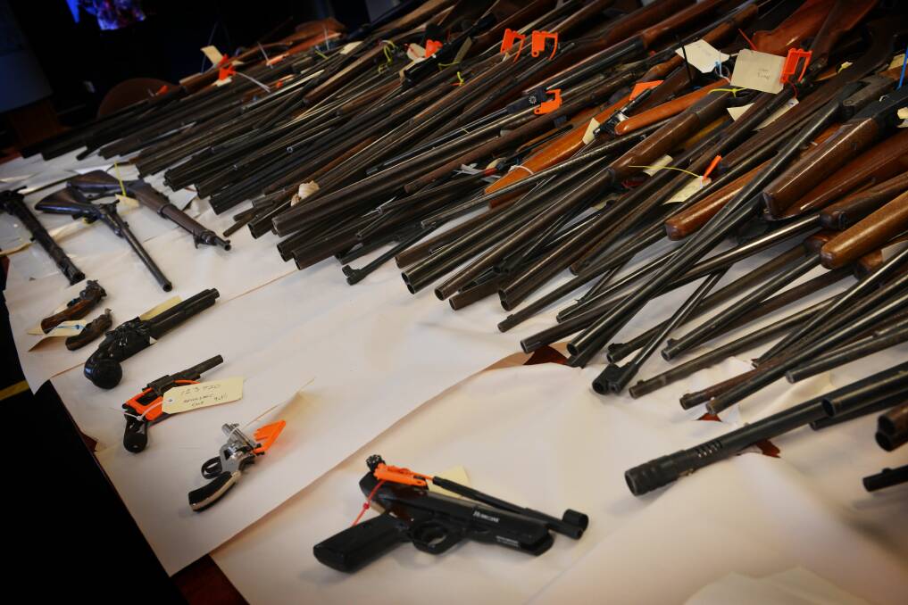 A file photo of guns handed in to Tasmania Police during an amnesty campaign.