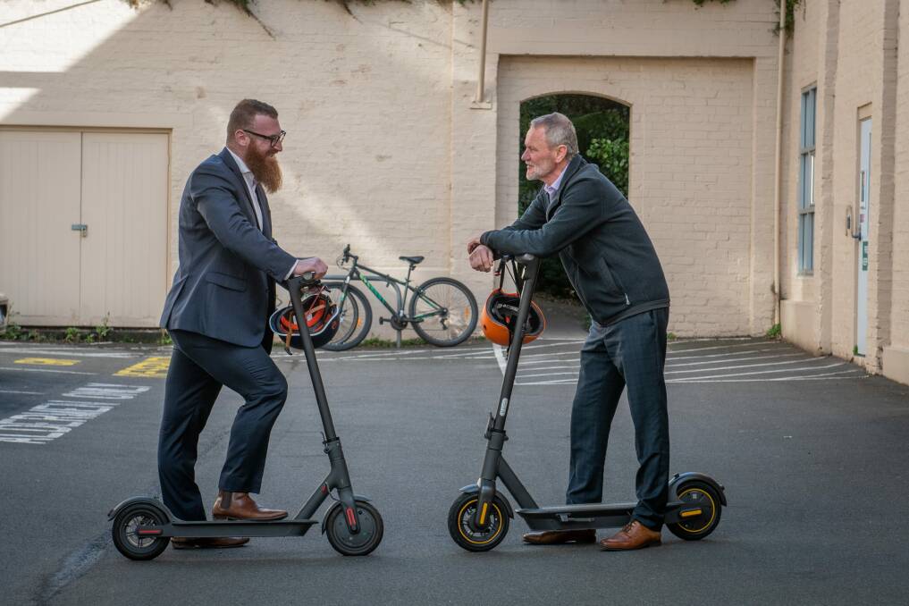 City of Launceston mayor Albert van Zetten (right) this month said he was pleased to see the number of e-scooter trips occurring in low-vehicle ownership areas in the northern suburbs. Picture: Paul Scambler