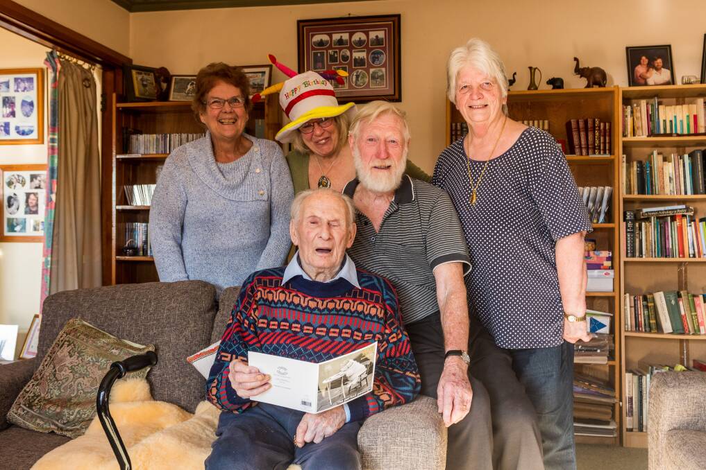 Ron Brelsford celebrates his 107th birthday with family friends Marianne Reardon and Moira Wellman, son David Brelsford and daughter-in-law Anne Brelsford at Legana. Picture: Phillip Biggs