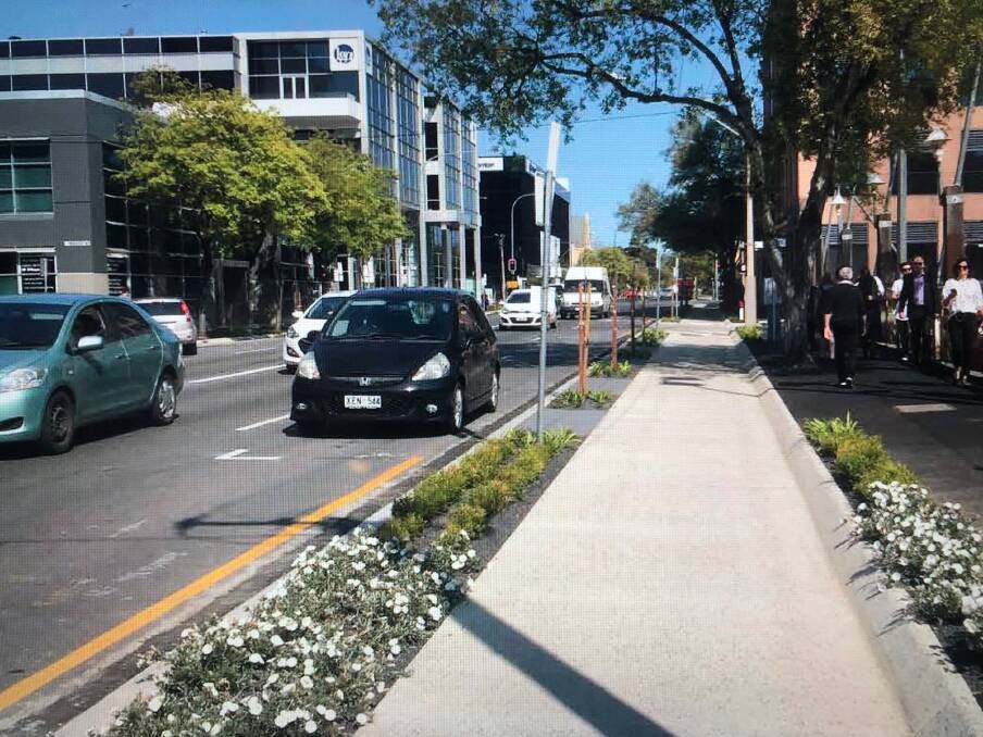 An integrated bike lane in the Adelaide CBD, completed after years of trial and error. The council now believes it has found the right outcome.