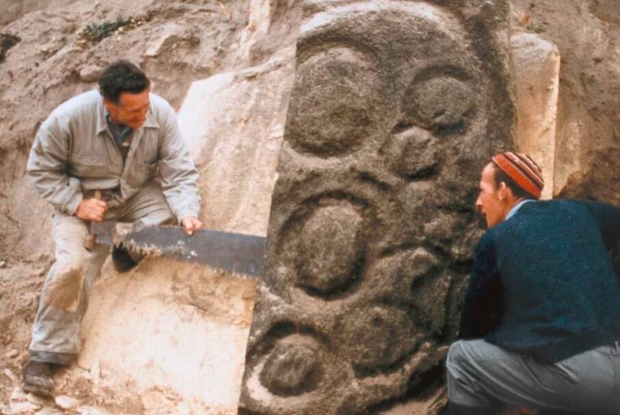 Workers remove the 14,000-year-old Preminghana petroglyphs from their original location on the far-North-West Coast in the 1960s. They are part of a network of Aboriginal rock carvings. Picture: supplied