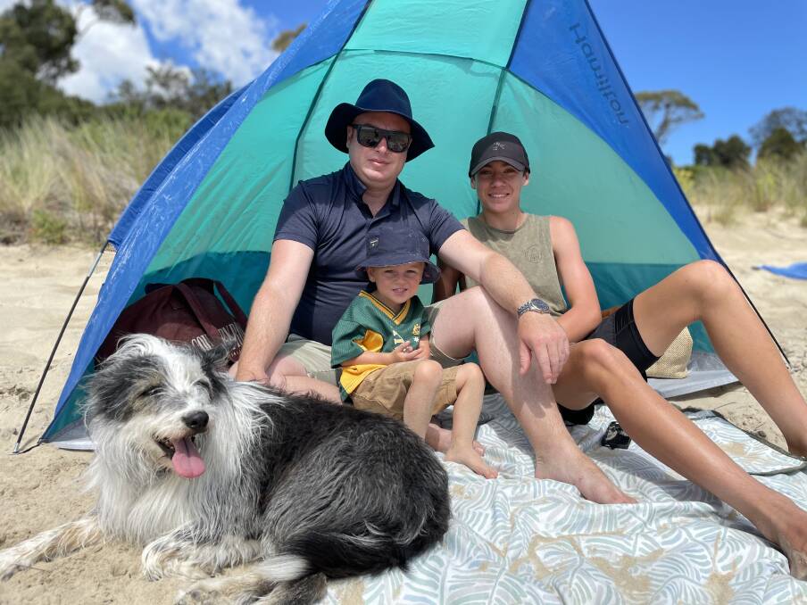 Josh, Archie and Thomas Riley with Roxy at Bridport on Australia Day. Picture: Brinley Duggan