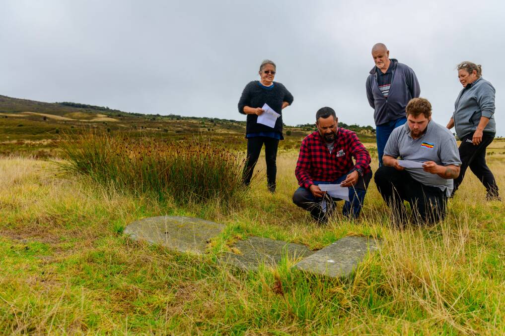 Above: Rangers, including Matthew Mansell and Bourbon-Jack Hodges, at the site of tombstones that were ploughed up in a field in the 1970s. The identities of those buried at the site have been found.
Pictures: Scott Gelston