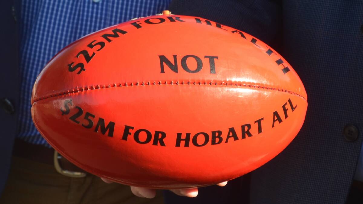 The Liberal Party successfully used Labor's promise for funding for an AFL team in Tasmania to frame the party as not being committed to health. Picture: Adam Holmes