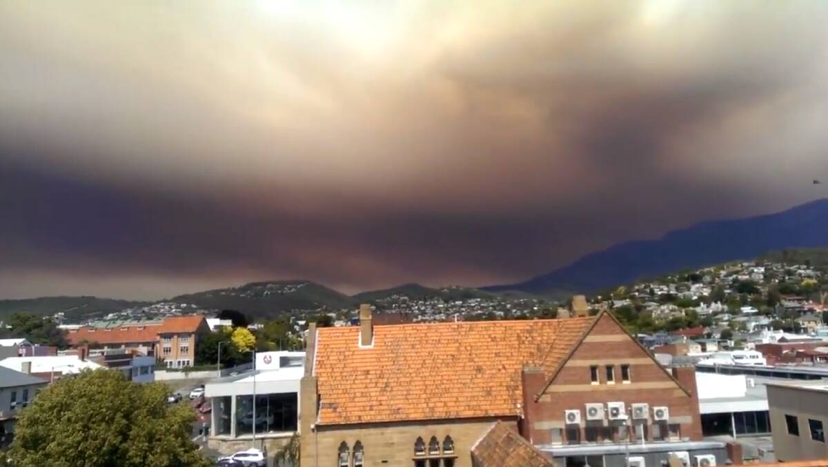 Thick smoke is covering Hobart from a bushfire in the Wilderness World Heritage Area. Image: Blair Denholm