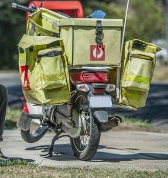 A postie's motorbike, similar to the one pictured, was stolen during a robbery in Launceston's north. 