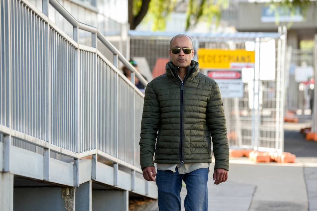 Gaurav Endlay arrives at the Launceston Magistrates Court on Thursday. His baby daughter Charlotte Lukendlay died suddenly in 2016, and is the subject of a coronial inquest. Picture: Paul Scambler