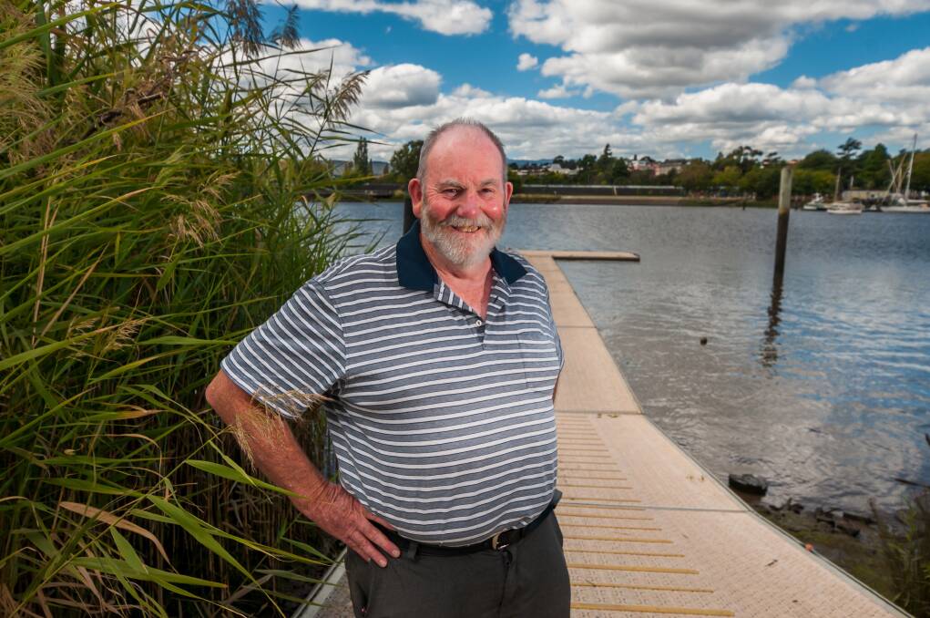 Tamar Rowing Club stalwart Jim Guy fears for the future if mudbanks are allowed to continue building up around the historic club's pontoon. Picture: Phillip Biggs