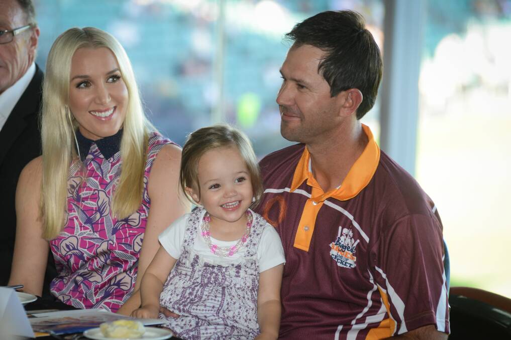 Ricky Ponting, with wife Rianna and daughter Matisse, receives the keys to Launceston during a ceremony at York Park in 2014. Picture: Phillip Biggs