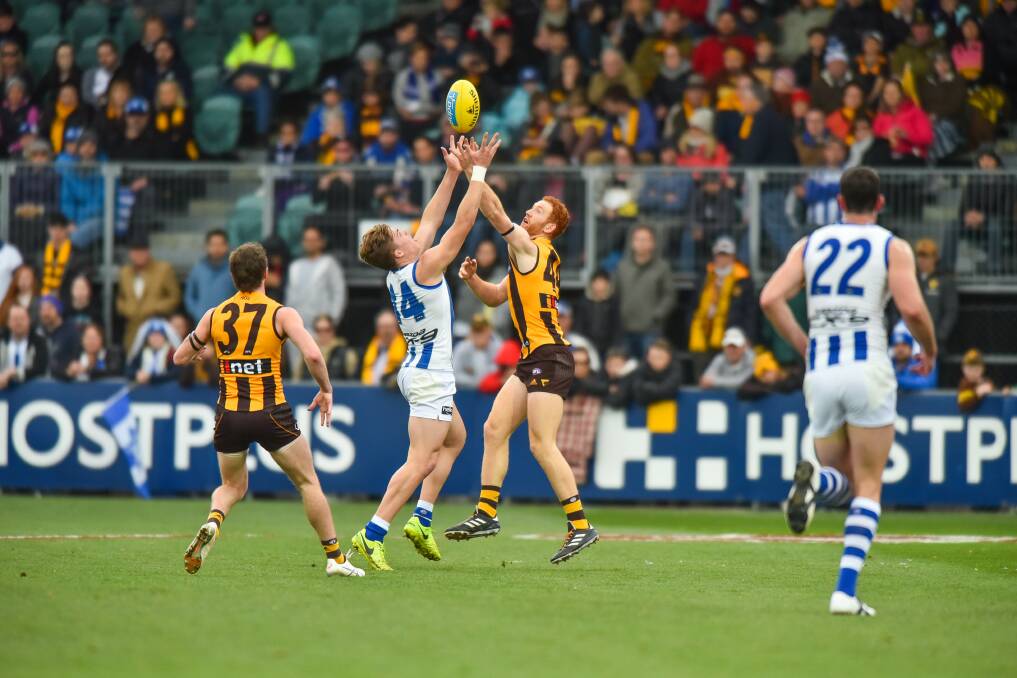 Hawthorn and North Melbourne play at UTAS Stadium in 2017. Their deals have been extended by another year.