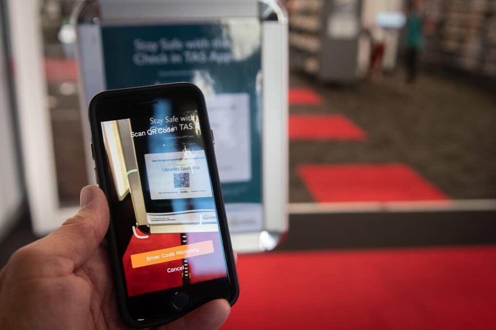 More than 2500 businesses have registered with the Check In Tas app, but venues still largely rely on the pen-and-paper contact tracing method. Picture: Paul Scambler