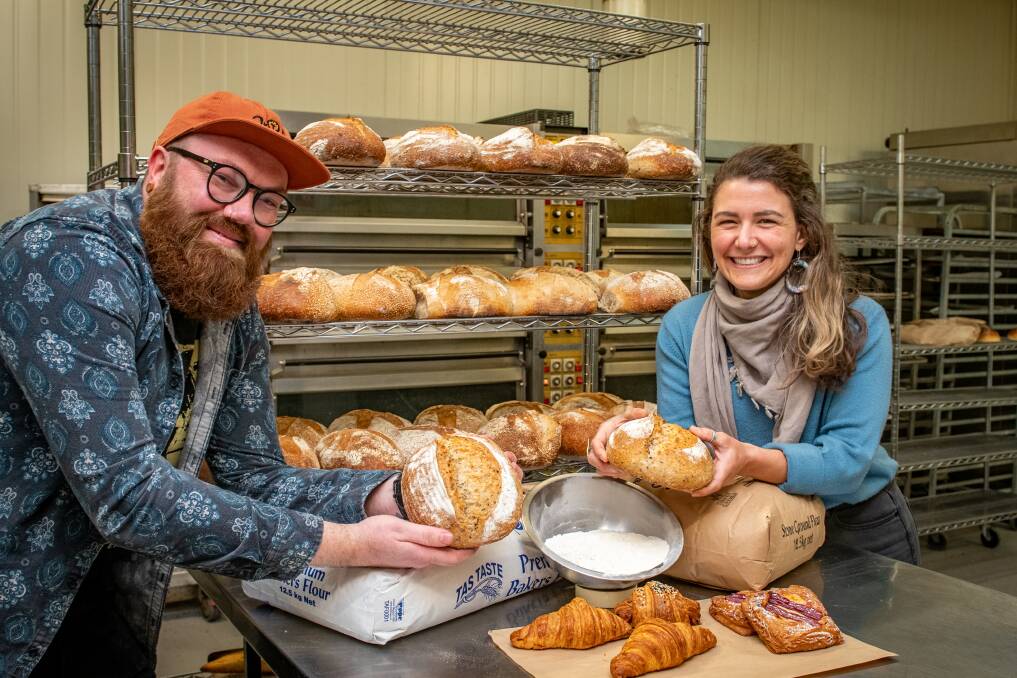 Sandy's Sourdough head baker and owner Josh Crisp with FermenTasmania communications manager Lauren Brown with some delicious offerings. Picture: Paul Scambler
