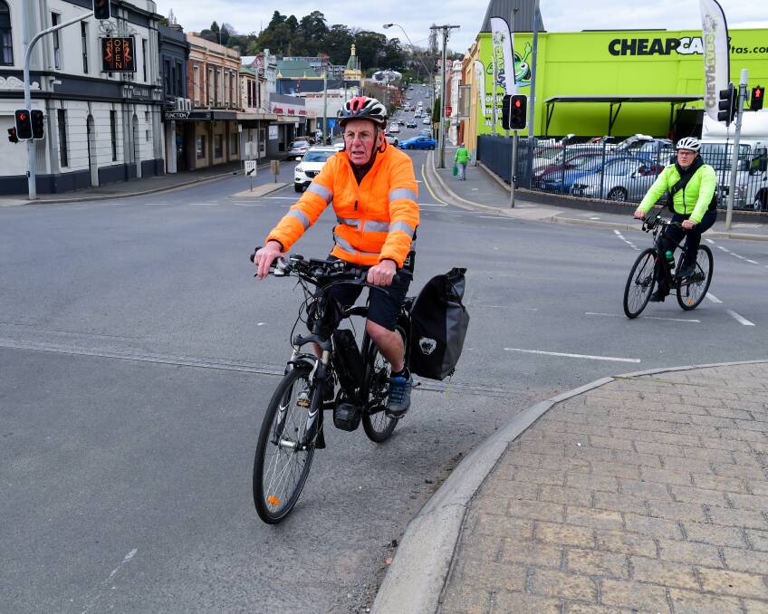 Malcolm Cowan and Malcolm Reid, of the Tamar Bike Users Group, attempt to cross the Tamar Street Bridge - considered one of the more dangerous areas for cyclists in Launceston. Picture: Neil Richardson