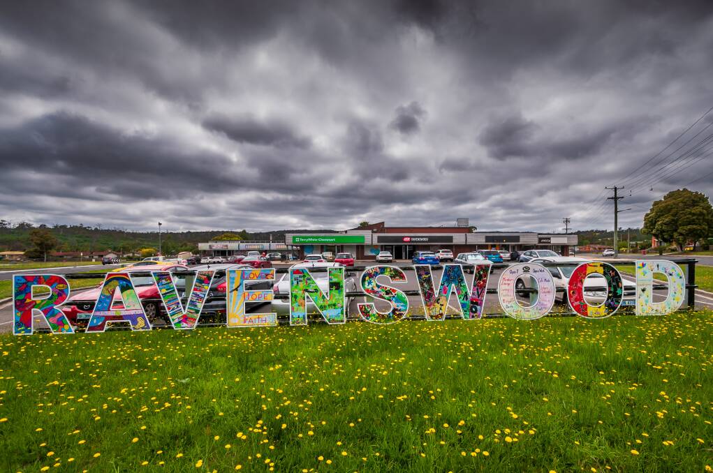 The "Ravenswood" sign was developed by the local community, and it remains a source of pride for many. Picture: Phillip Biggs