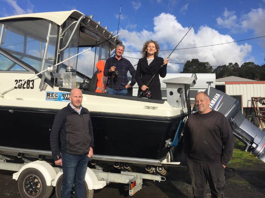 Labor's Shane Broad with recreational fishers Todd Lambert, Janet Lambert and Mark Tapsell in Launceston, calling on the government to lift restrictions on boat ramps. Picture: Adam Holmes
