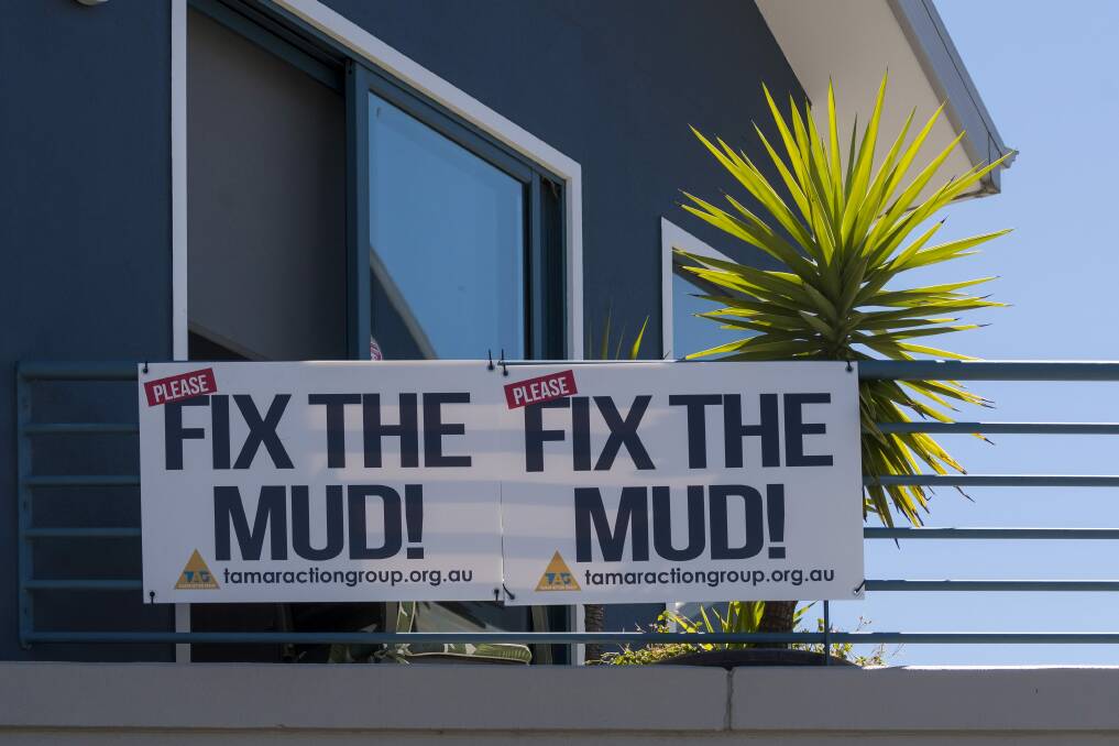 "Fix the Mud" sounds hang throughout The Seaport and in other parts of the city. Picture: Phillip Biggs