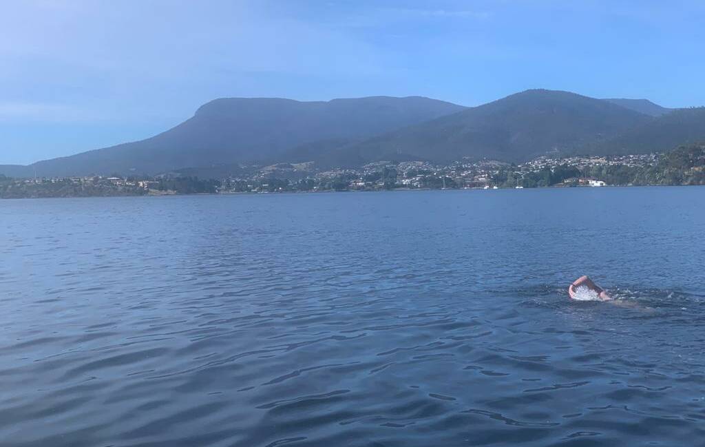 Ross approaches Hobart in the final part of the swim on Sunday, December 13. Picture: Christopher Guesdon