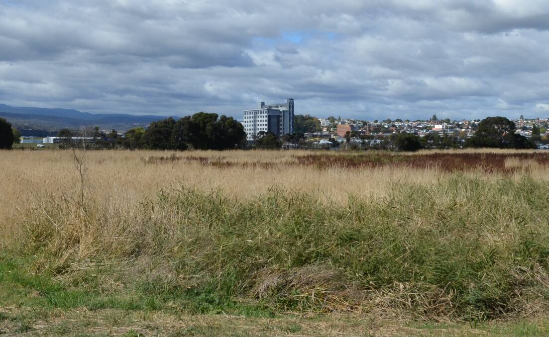 The silt deposit ponds alongside the West Tamar Highway at Riverside could be used again to store dredged material from the Tamar. Picture: Adam Holmes