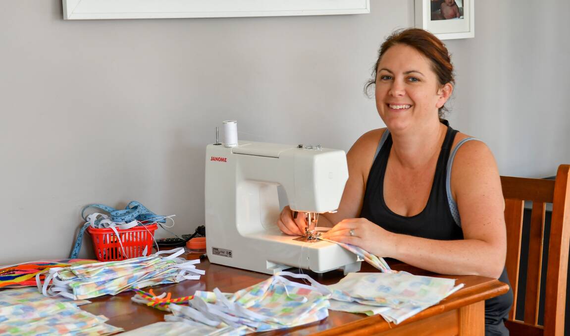 Melanie Griffin, of Lilydale, says it does not take long to learn how to sew together the face mask kits. But there's a desperate need for more material. Picture: Scott Gelston