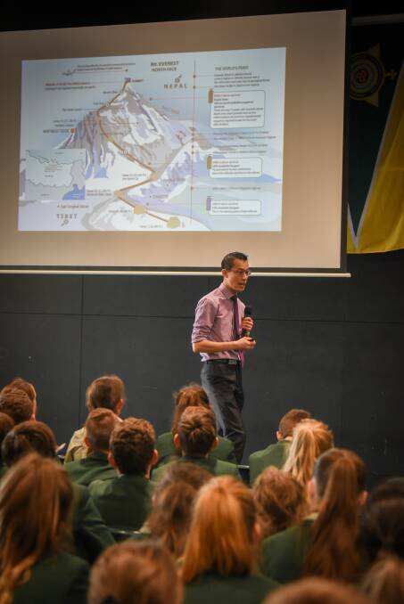 Eddie Woo explains the science of scaling mountains to students at St Patrick's in Launceston. Picture: Paul Scambler