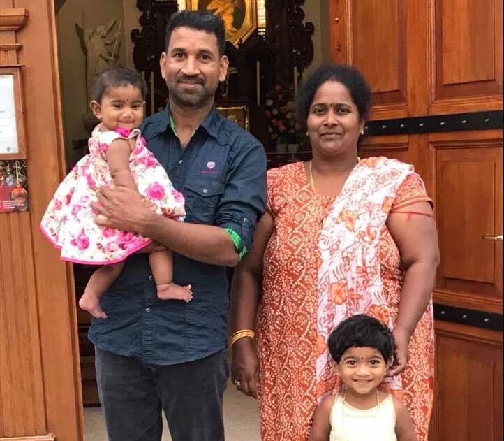 Nades and Priya Murugappan with their Australian-born daughters Tharnicaa - who was medically evacuated from Christmas Island last week - and Kopika. Picture: Home to Bilo