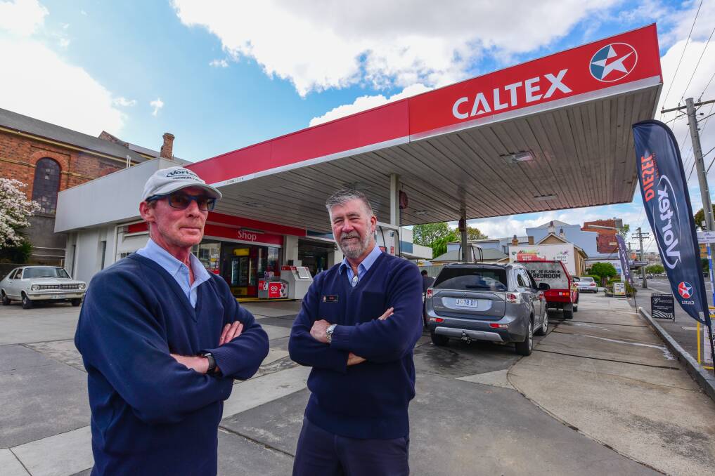 Wayne Sharp and owner Mal Philpot, who have worked at the Charles Street site for a combined 48 years, say driveway service will be missed in Launceston. Picture: Paul Scambler