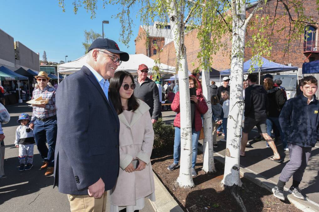 The Prime Minister turned heads and got a positive reception at the Launceston Harvest Market. Picture: Paul Scambler