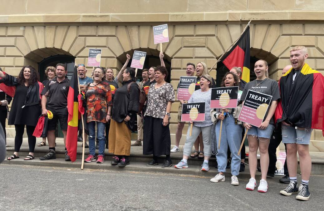 Members of the Tasmanian Aboriginal community gather outside Parliament House on Thursday as the Premier releases a report into truth-telling and treaty. Picture: Adam Holmes