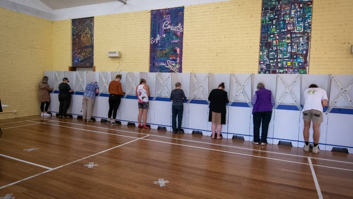 Tasmanians vote in the election on Saturday. A Windermere candidate claims the "unfairness" of hosting dual lower and upper house elections was on display. Picture: Paul Scambler