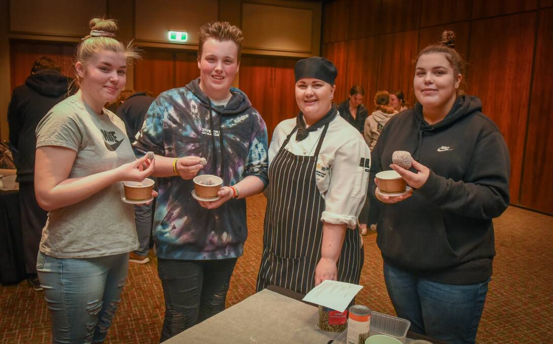 Newstead College students Taleisha Grace, Broden Howlett-Kneale and Rebeka Davey with chef Jessica Howe during the Statewide Hospitality Career Showcase at Country Club Tasmania on Wednesday. Picture: Paul Scambler
