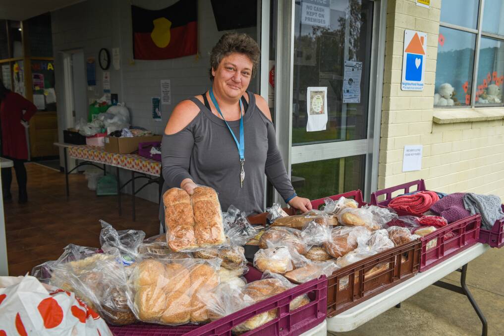 Peta Bricknell with some of the bread provided to Ravenswood Neighbourhood House by Loaves and Fishes, allowing those struggling with living costs to access food parcels. Picture: Paul Scambler