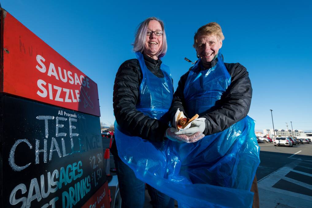 Teen Challenge directors, wife and husband Tanya Cavanagh and Peter Ferrall, at their Bunnings sausage sizzle fundraiser on Sunday. Picture: Phillip Biggs
