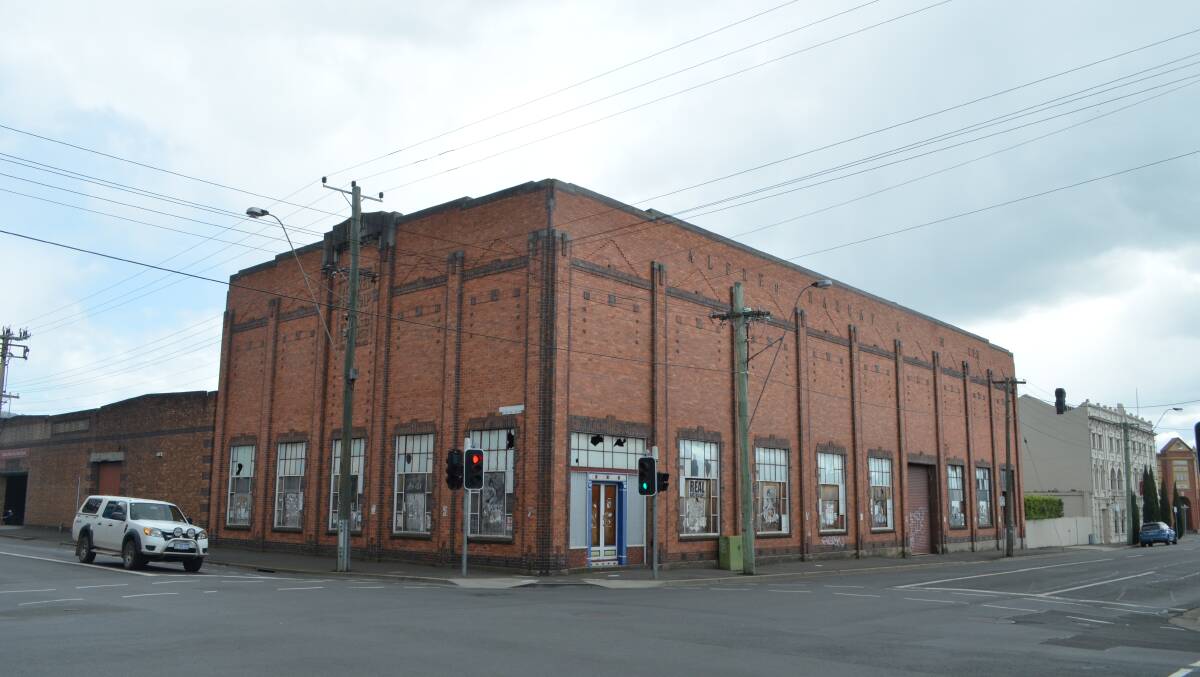 The Alfred Harrap & Son warehouse is currently used for car parking. Picture: Adam Holmes