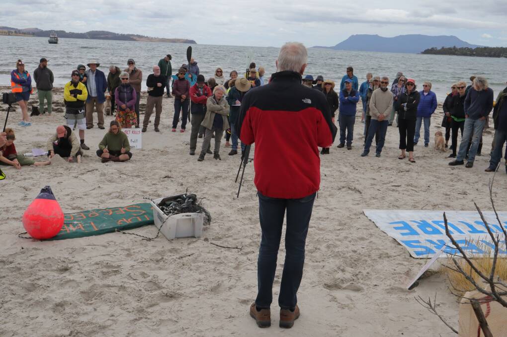 Graeme Wood speaks to gathered protests at Orford on Sunday. Picture: Supplied