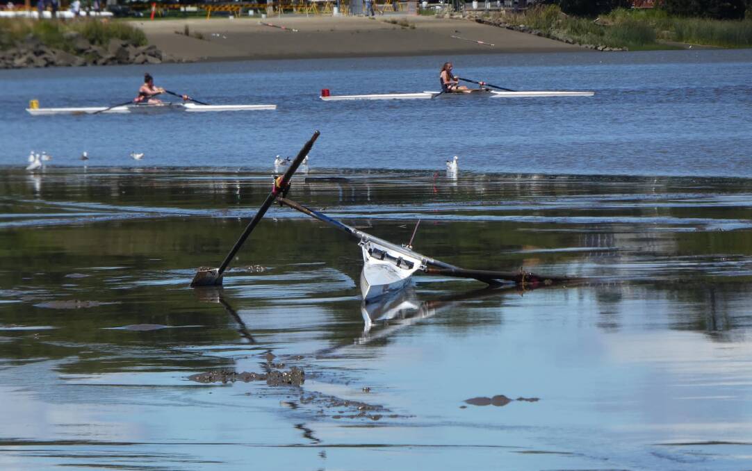 The single scull row boat following the retrieval of a St Patrick's student on Sunday. Picture: Lyn Marsden