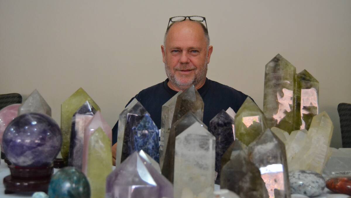 Mahrcus Robinson, of Bridport, with his array of crystals. Picture: Adam Holmes
