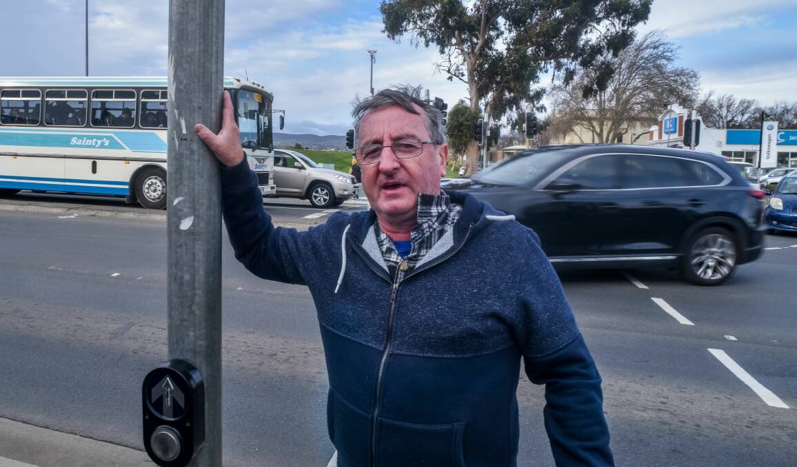 Councillor Paul Spencer at the intersection of the East Tamar Highway and the Esplanade, where he believes traffic lights are contributing to congestion. Picture: Neil Richardson