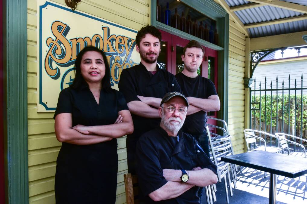 Smokey Joe's Creole Cafe owner Jon Peterson with staff Nani Juliani, Tom Byrne and Hunter Peterson, refusing to sign up to Uber Eats. Picture: Neil Richardon