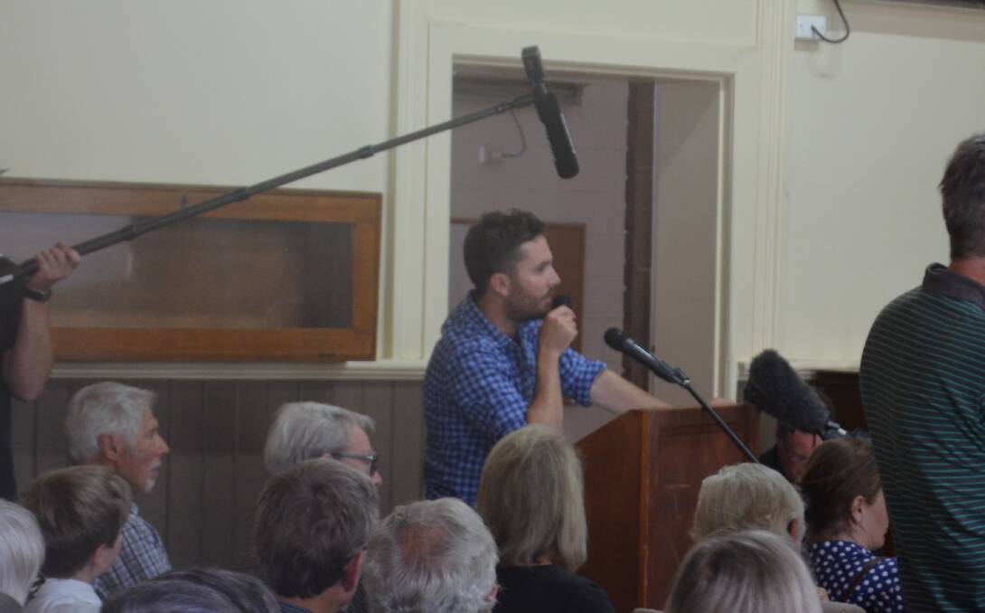 Daniel Hackett speaks at the Central Highlands meeting on Tuesday.