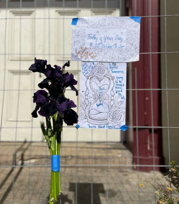 Notes and some flowers left at Milton Hall. Picture: Craig George
