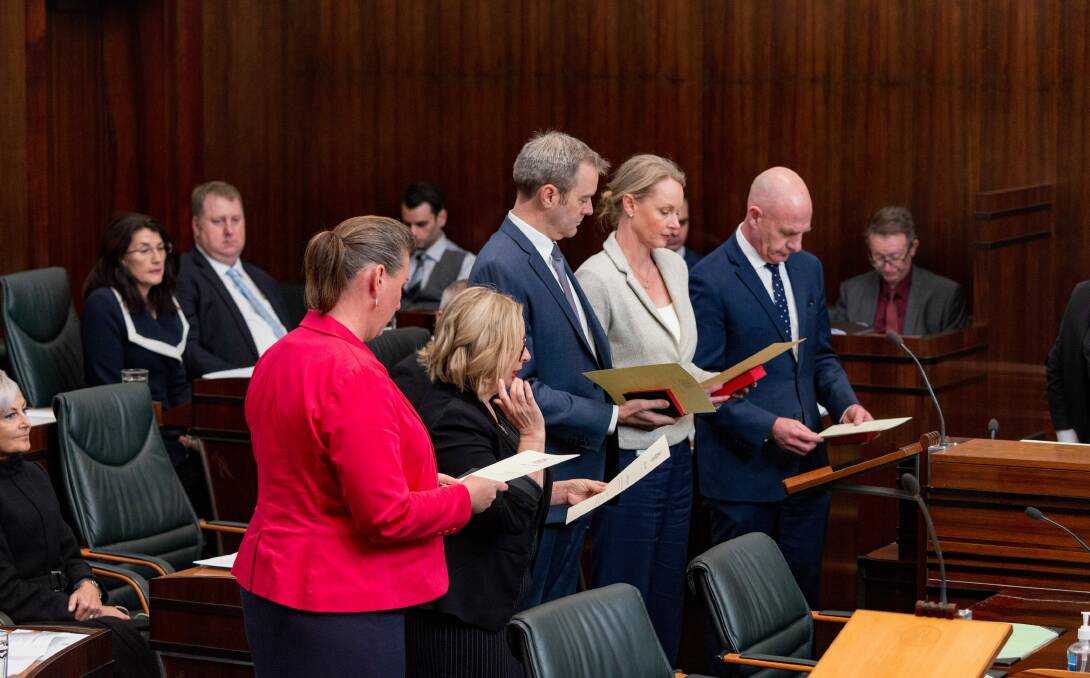 Members are sworn in last year. The resignations of Sarah Courtney and Peter Gutwein have shone further light on the workload pressures facing ministers in a reduced House of Assembly. Picture: Phillip Biggs