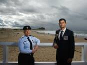 Proud Day: Anzac Day has deep meaning for RAAF corporal Rebecca Roach and Australian Army captain Doyle Beaudequin, pictured at Nobbys beach. Picture: Jonathan Carroll 