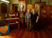 Prayers for Ukraine: Olga and Victor Bazalej inside the Ukrainian Catholic Church at Adamstown. Pictures: Jonathan Carroll  