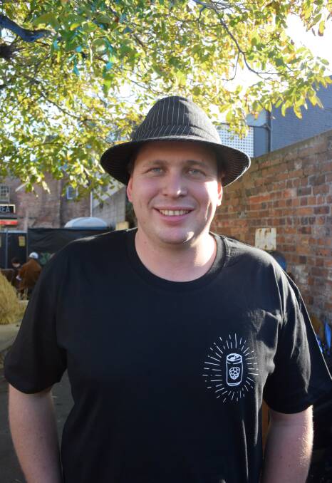 GOOD TIMES: Fresh Hop Beer Festival organiser Tim Jarosz enjoys the first day of the festival in Vincent Street. Picture: Alicia Barker.